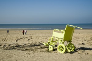 painted wheelchair on dutch beach