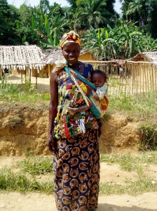 congolese mama in north kivu on her way to her farm plot